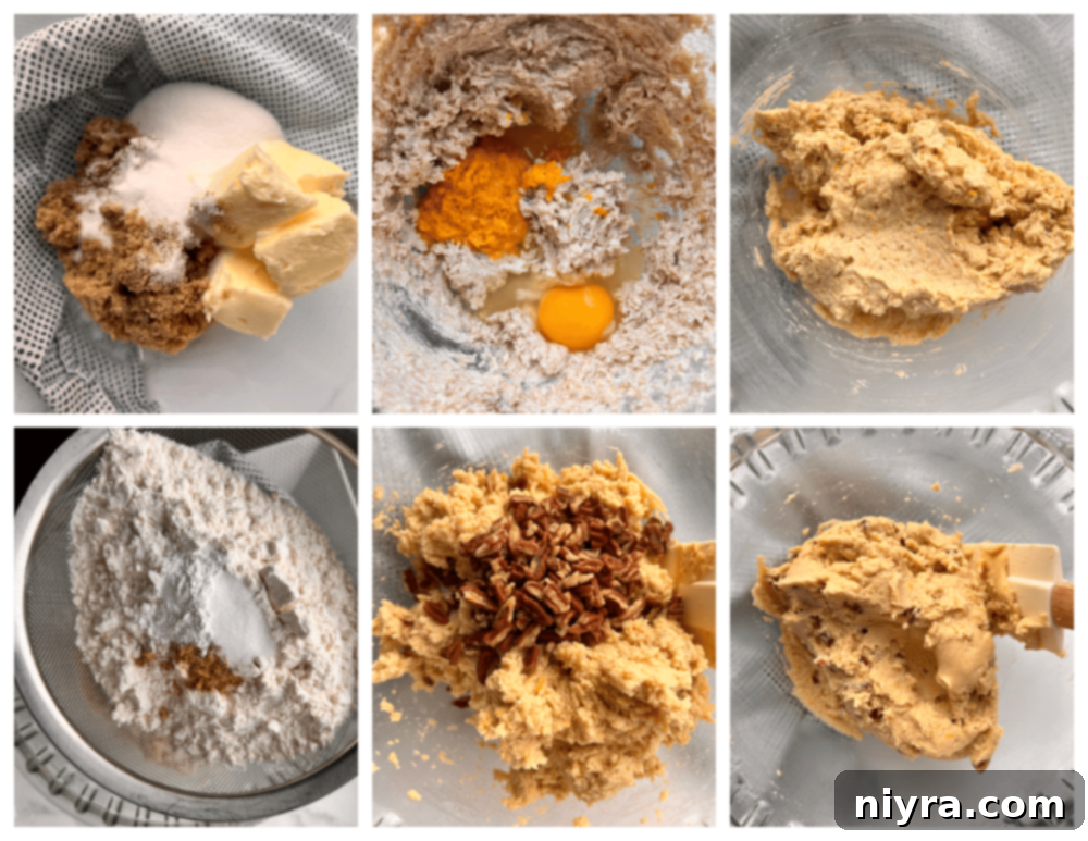 A bowl of orange zest, ground ginger, and other cookie ingredients laid out on a table.