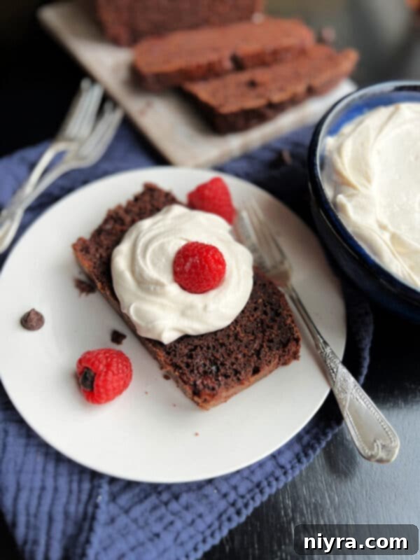 Overhead shot of a full Chocolate Sauerkraut Pound Cake loaf, sliced and ready to serve