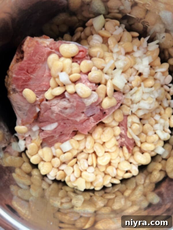 Grandmas Hearty Instant Pot Ham and Bean Soup 11 Ham bone placed inside an Instant Pot, ready for cooking