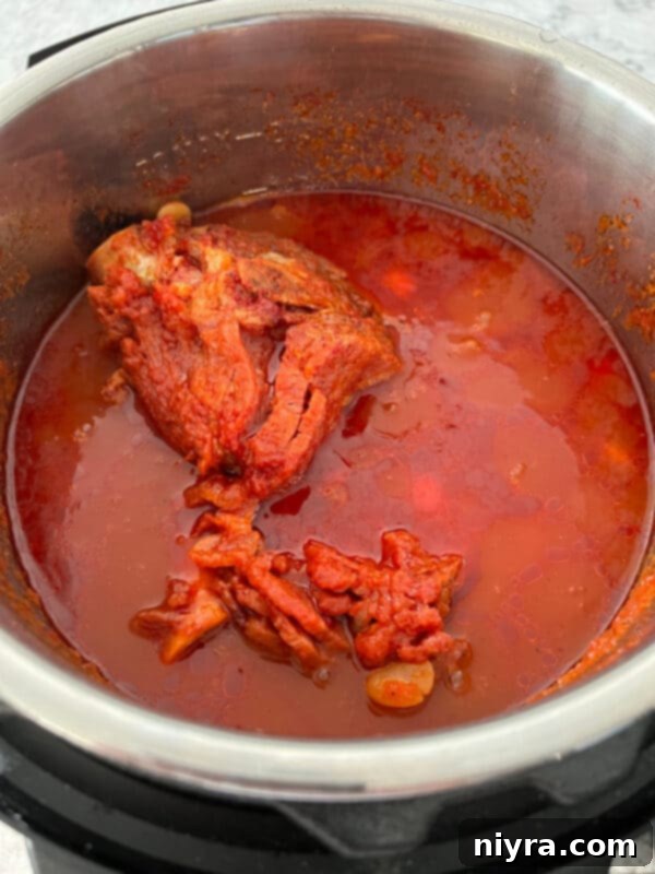 Grandmas Hearty Instant Pot Ham and Bean Soup 12 Instant Pot showing the display during Ham and Bean Soup cooking