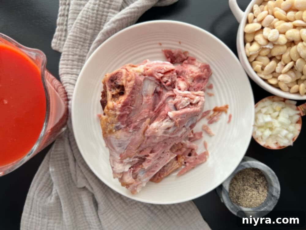 Grandmas Hearty Instant Pot Ham and Bean Soup 5 Ingredients for Instant Pot Ham and Bean Soup spread on a table