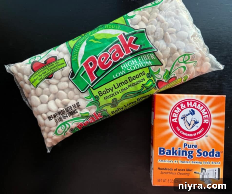 Grandmas Hearty Instant Pot Ham and Bean Soup 7 Lima beans and baking soda for soaking, laid out on a surface