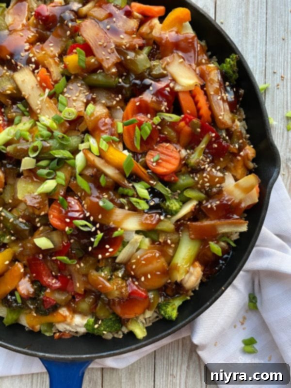 Baked Teriyaki Chicken Casserole garnished with green onions and sesame seeds