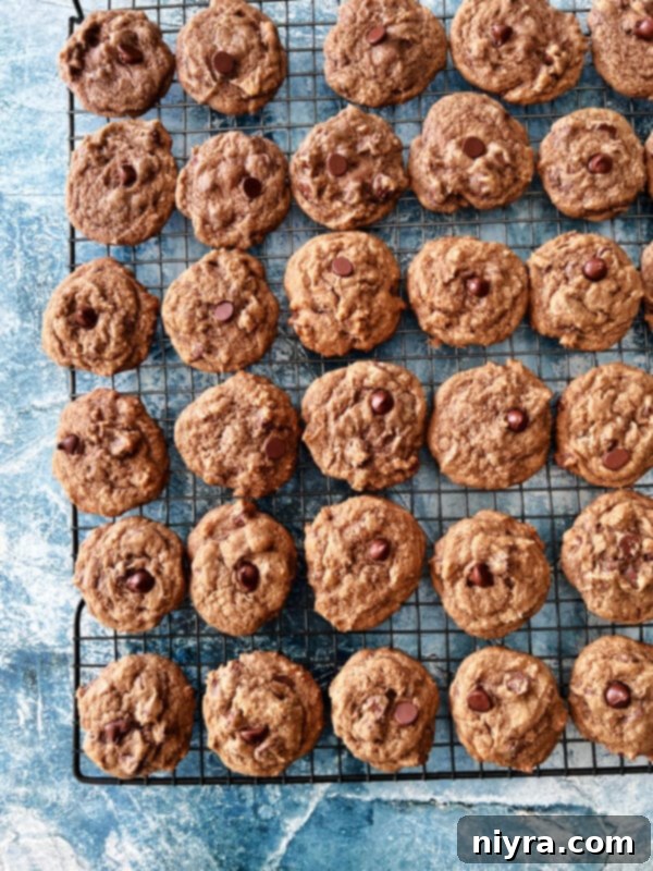 Freshly baked Bailey's Irish Cream Chocolate Chip Cookies on a baking sheet