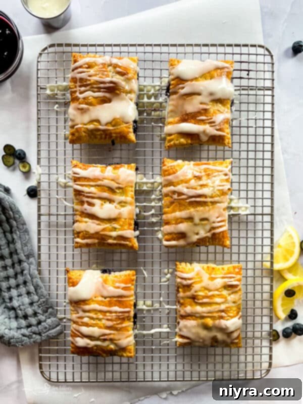 A perfectly baked homemade blueberry toaster strudel, golden and flaky.