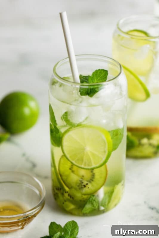 Refreshing Kiwi Mojito 4 Close up of fresh kiwi, lime, mint, and honey - ingredients for Kiwi Mojito