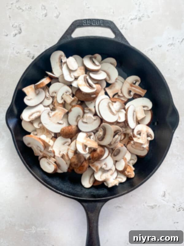 Mushroom Smothered Salisbury Steak 7 Sautéing Mushrooms in a Skillet
