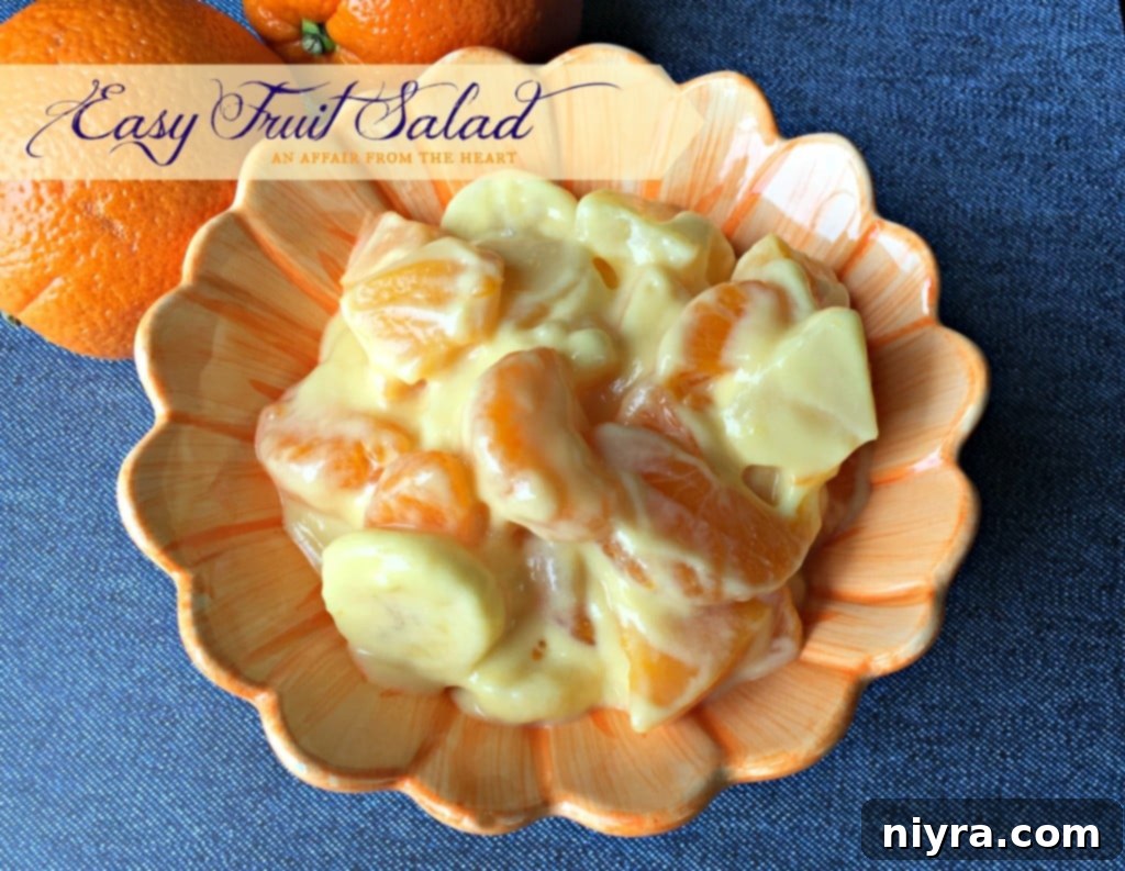 easy fruit salad - a vibrant mix of peaches, mandarin oranges, and pineapple in a creamy orange vanilla sauce