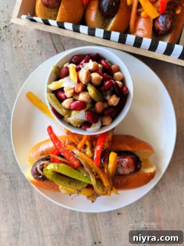 Platter of Italian Sausages with Peppers and Onions ready to serve