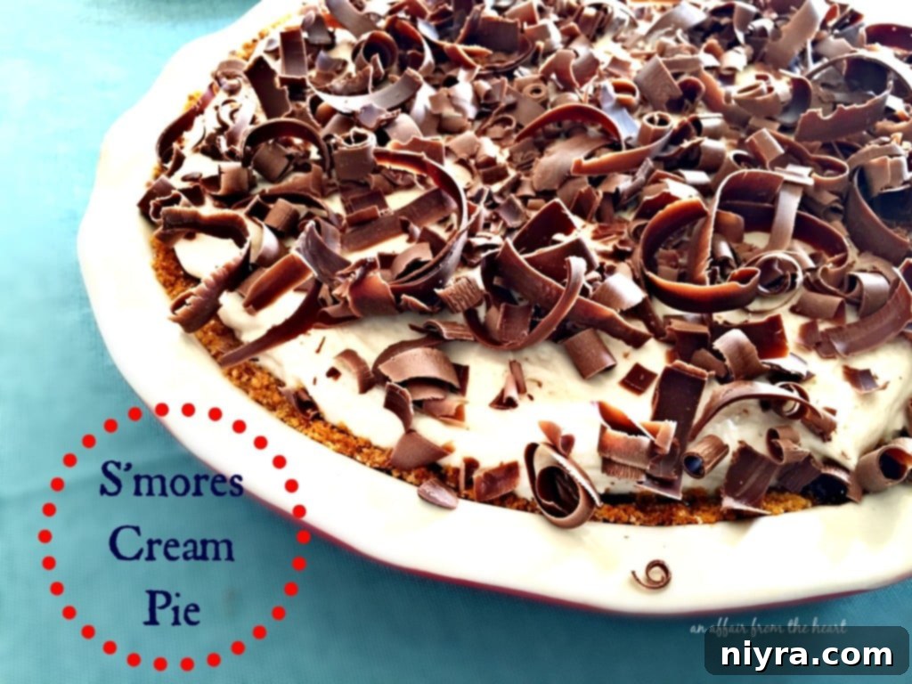 Decadent S'mores Cream Pie slice on a plate