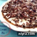 S'mores Cream Pie on a blue surface with text 's'mores cream pie'