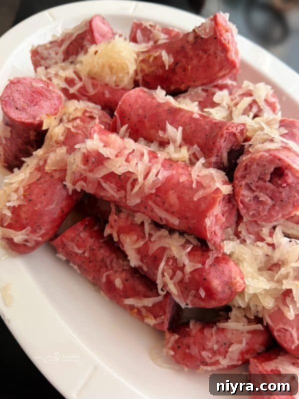 Smoked Polish Sausage and Sauerkraut 2 Smoked Polish Sausage and Sauerkraut in a dutch oven, ready to be served