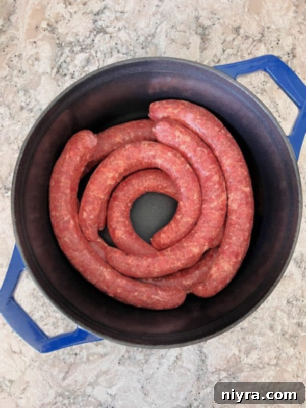 Smoked Polish Sausage and Sauerkraut 4 Step 1: Lay sausage in dutch oven