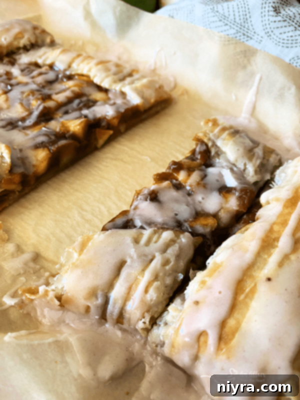 pieces of apple pumpkin strudel on parchment paper