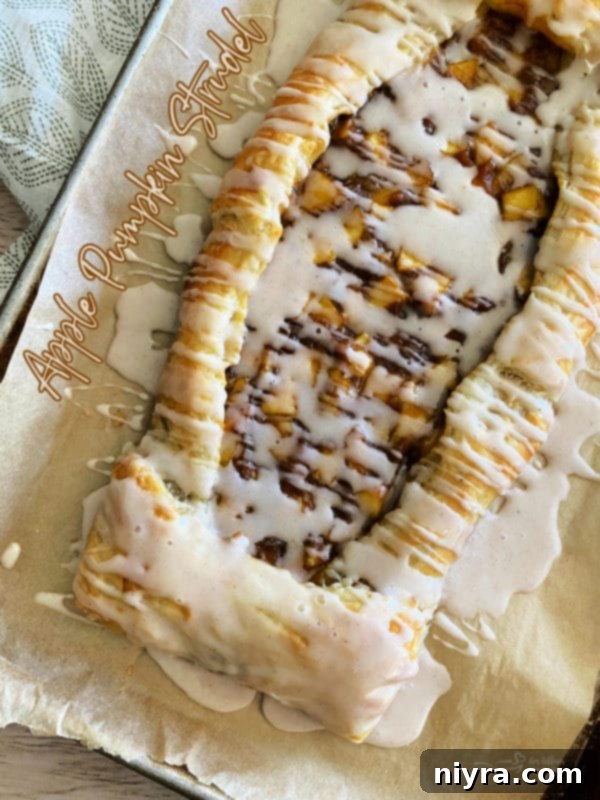 baked apple pumpkin strudel with icing
