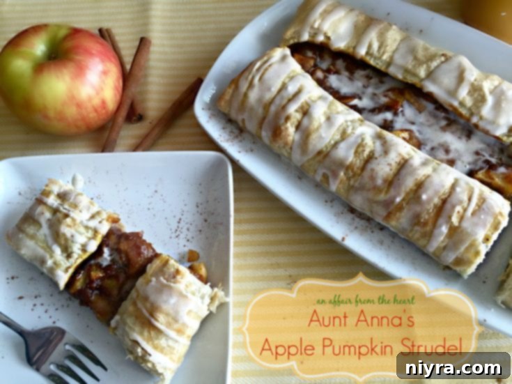 Apple Pumpkin Strudel on a white serving plate and a slice on a white plate with text 