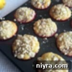 Lemon Raspberry Crumb Muffins in a muffin tin