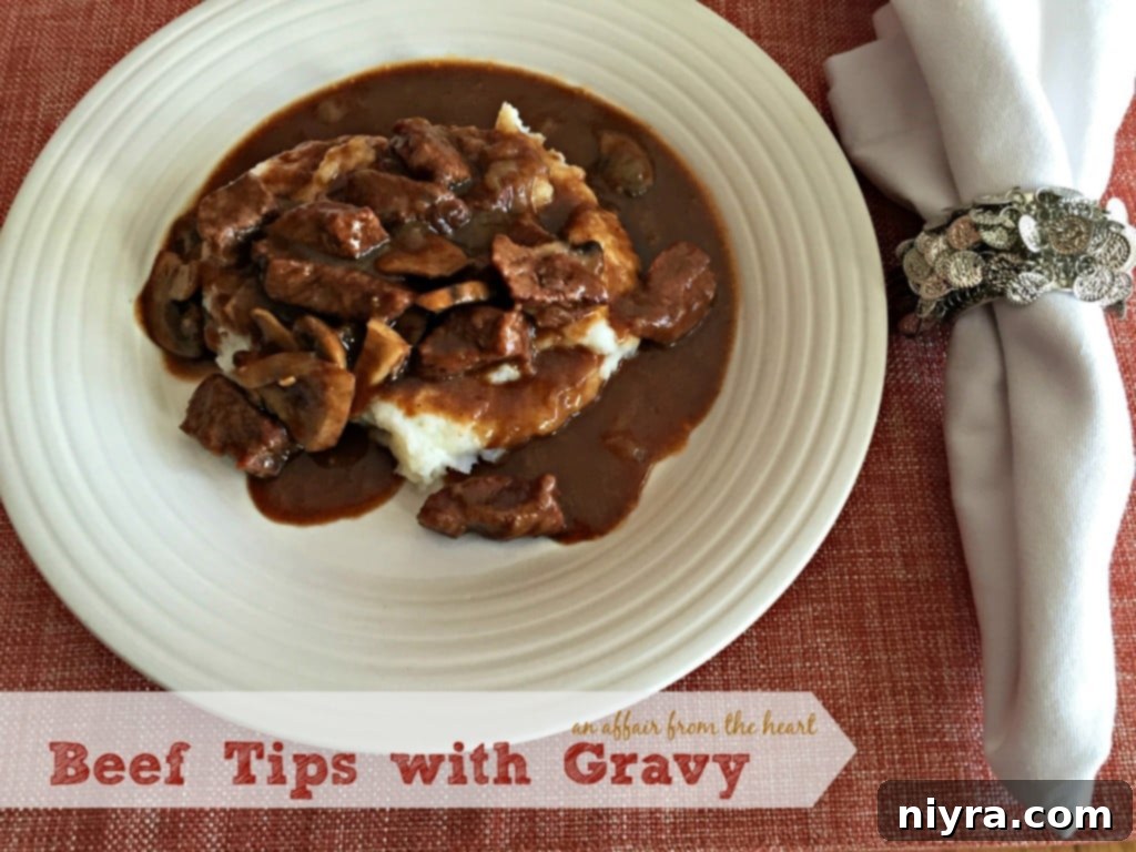 Classic Beef Tips with Gravy, showcasing a rich, savory homemade sauce over tender beef.