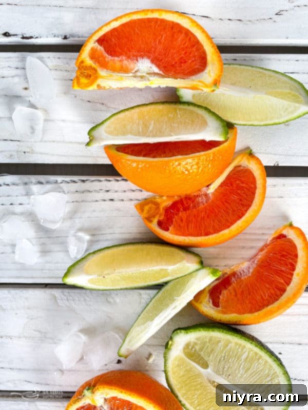 Close-up of a Kentucky Mule with a lime wedge and mint sprig.