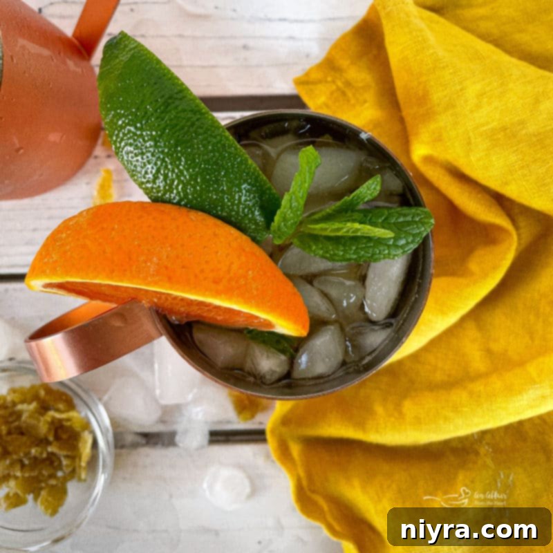 Step-by-step assembly of a Kentucky Mule in a copper mug.