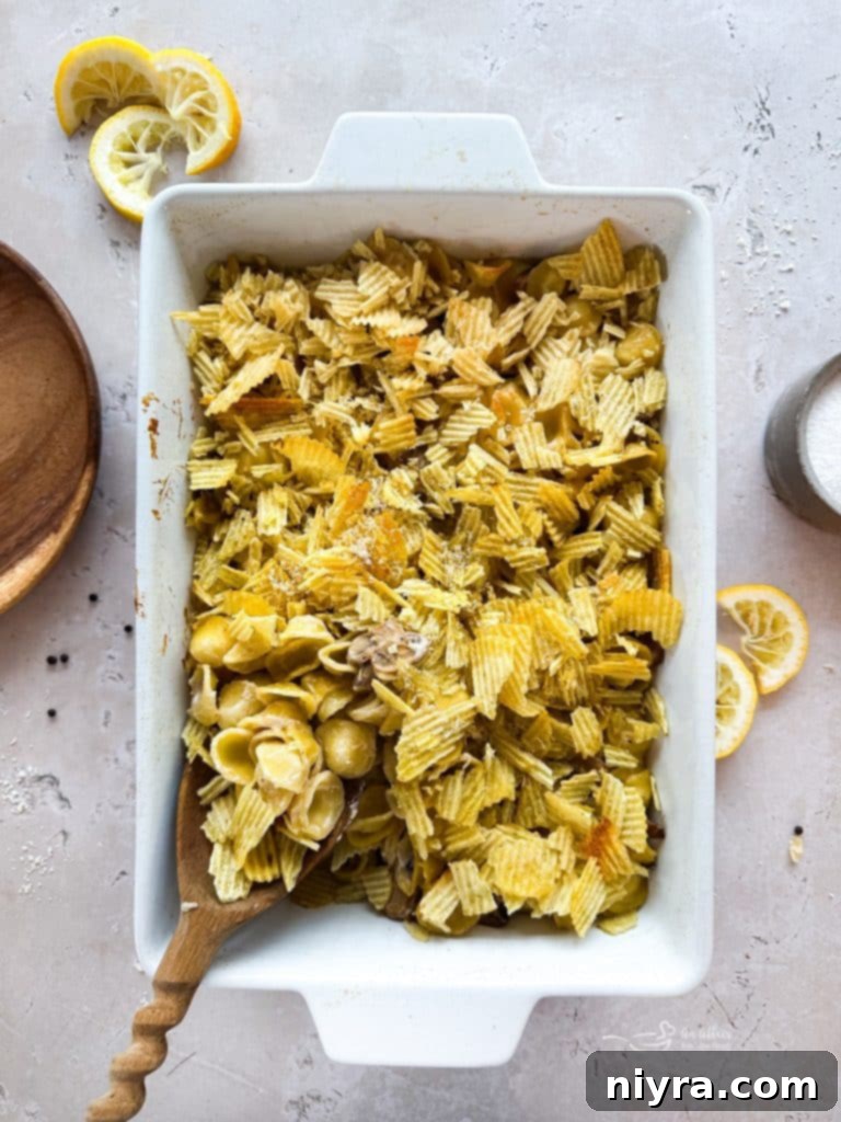 A close-up of Tuna Tetrazzini Casserole with a crispy potato chip topping.
