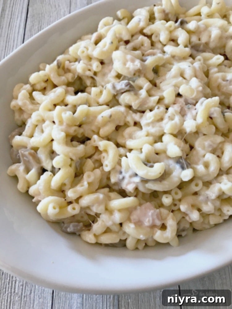Overhead of Mom's Tuna Tetrazzini Casserole in a white casserole dish