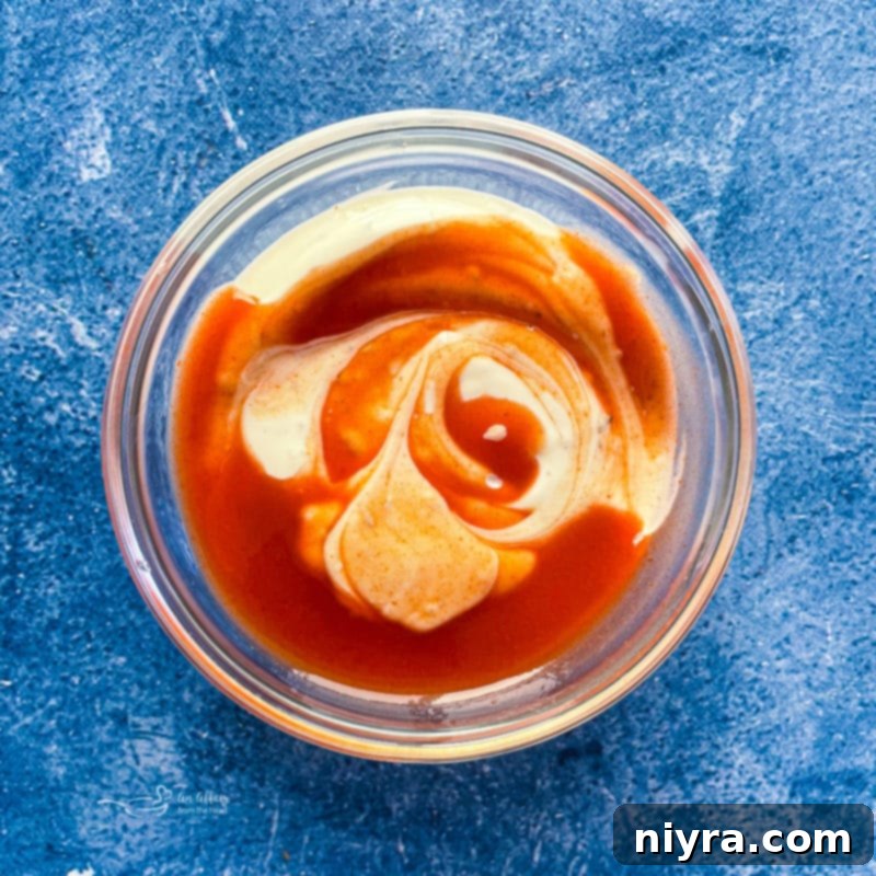 Prepping the pizza crust, showing it poked with holes