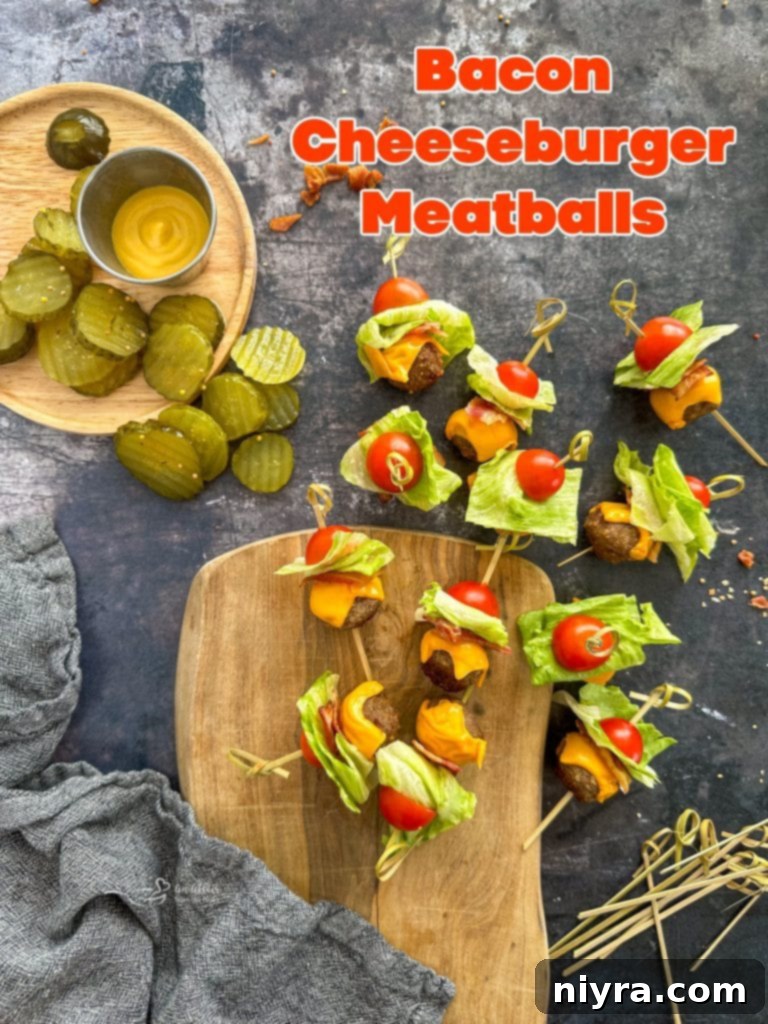 Bacon Cheeseburger Meatballs on skewers on a platter