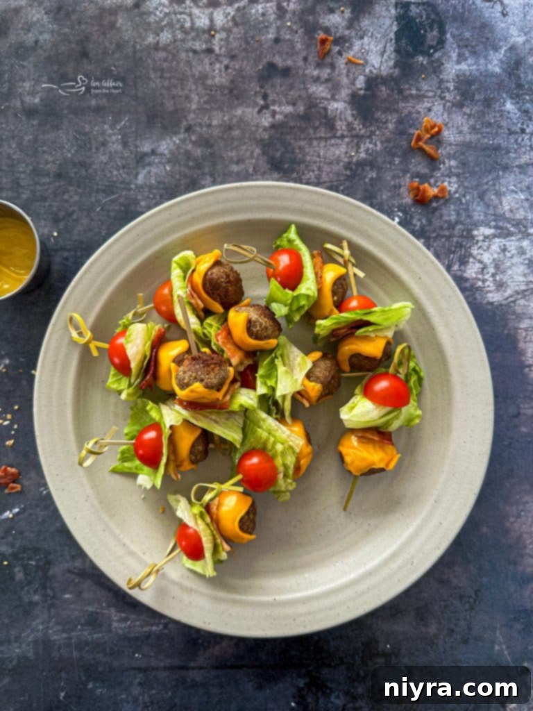 Close up of Bacon Cheeseburger Meatballs being assembled