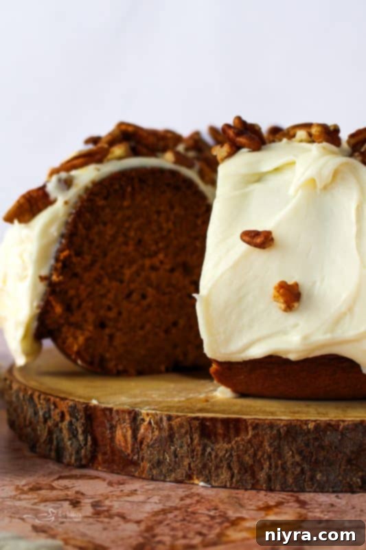 Cinderella Pumpkin Bundt Cake with Cream Cheese Frosting 2 Moist Pumpkin Bundt Cake with Cream Cheese Frosting and Toasted Pecans