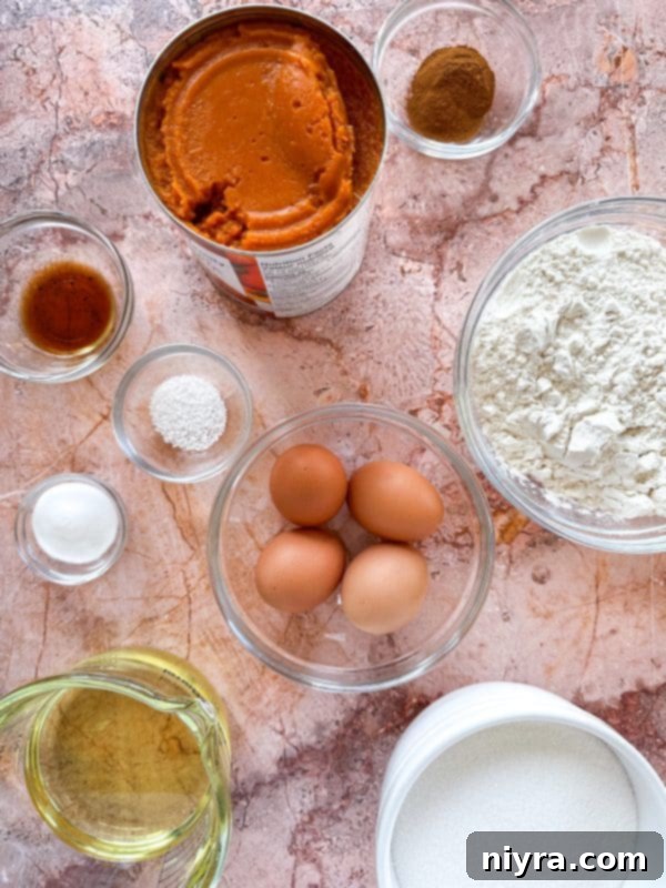Cinderella Pumpkin Bundt Cake with Cream Cheese Frosting 4 A slice of Pumpkin Bundt Cake with Cream Cheese Frosting and pecans, ready to be served.