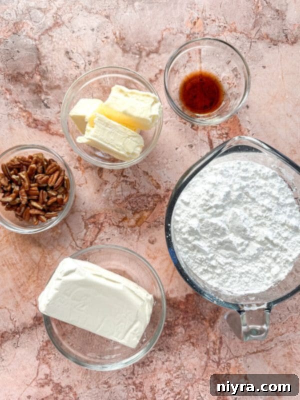Cinderella Pumpkin Bundt Cake with Cream Cheese Frosting 5 Ingredients for Pumpkin Bundt Cake laid out on a kitchen counter
