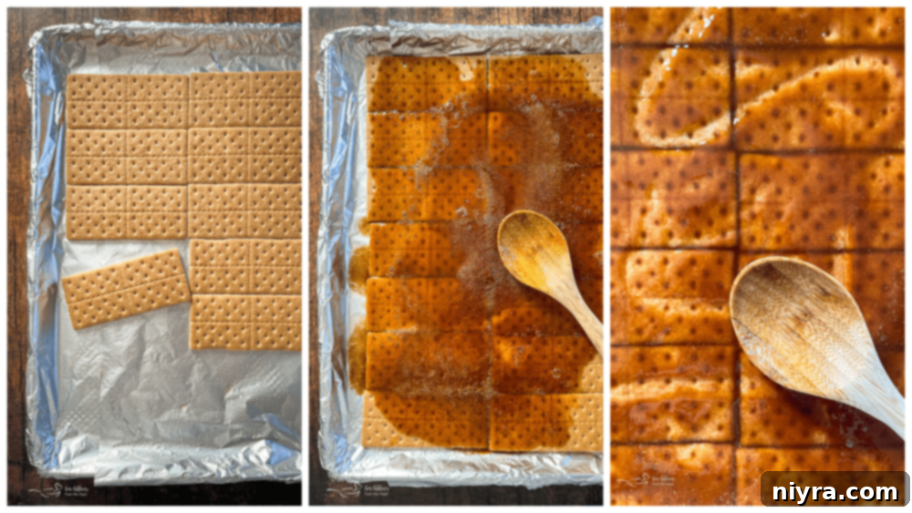 Spreading the warm brown sugar and butter mixture evenly over the graham crackers with a spoon.