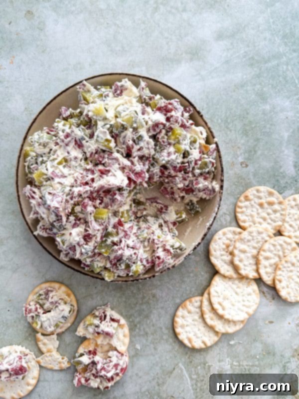 Creamy Dill Pickle Dip in a bowl with crackers