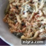 Decadent Bacon Ranch Pasta Salad 5 Pasta salad in a white bowl with text "Creamy Bacon & Ranch Pasta Salad"
