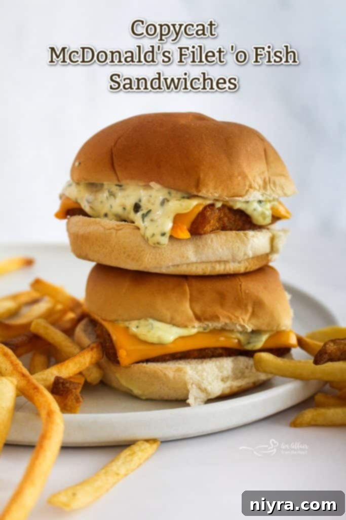 A stack of several homemade Filet-O-Fish sandwiches, ready to be served.