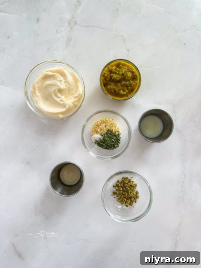 Ingredients for the McDonald's tartar sauce: dill relish, capers, minced onion, milk, parsley, lemon juice, sugar, and mayonnaise.