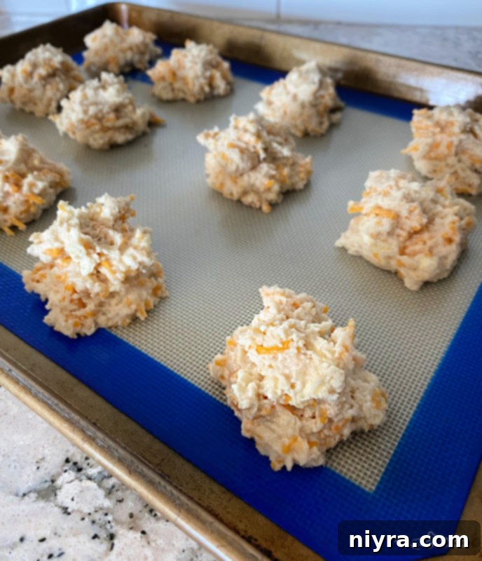 View of rounded spoonfuls of Red Lobster cheddar biscuits