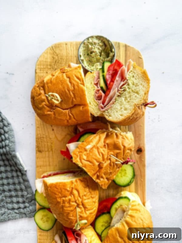 A close-up of the delicious layers within the Garden Club Hoagie Sandwich.