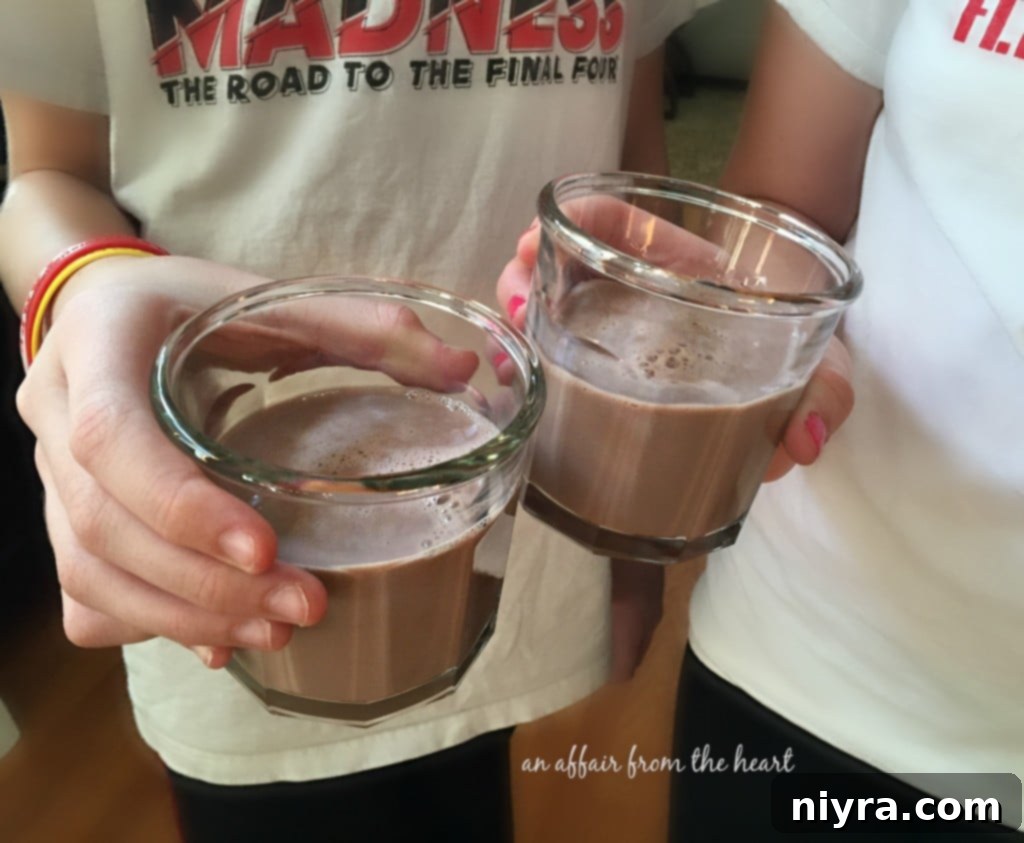 Fully Loaded Mac 'n Cheese 11 Glass of TruMoo Calcium Plus Chocolate Milk and a plate of Loaded Mac 'n Cheese