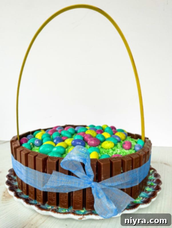 Close-up of a blue ribbon tied around the Kit Kat Easter Cake, showcasing the detail and stability it provides.
