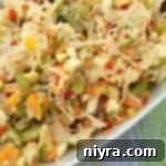 Bright Kraut Slaw 9 Sauerkraut Salad served in a bowl, ready to be eaten. (Pinterest image)