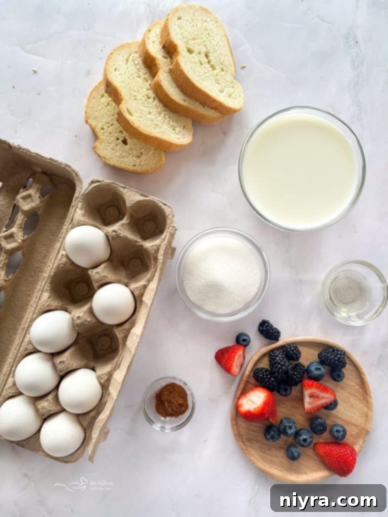Stacked French toast slices, rich golden brown, garnished with fresh berries.