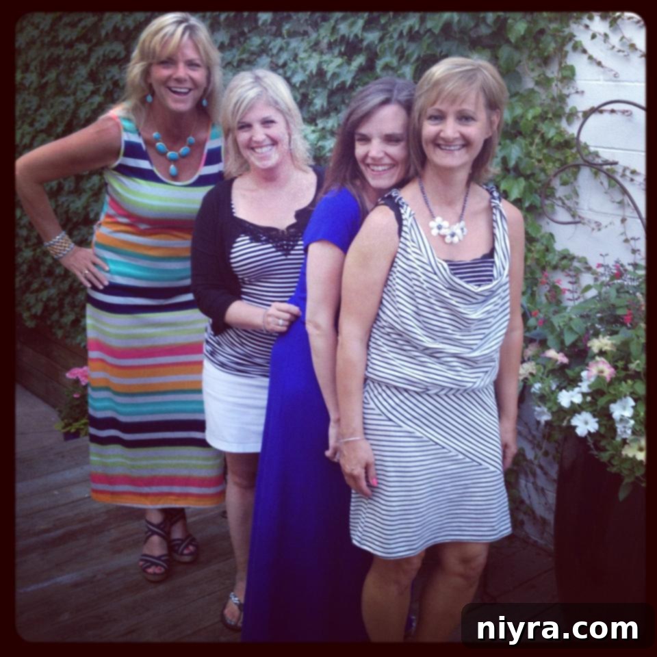 Author enjoying a charcuterie board with friends at a birthday dinner