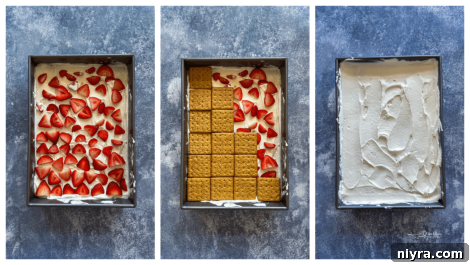 Adding the first layer of whipped cream and strawberries over graham crackers.