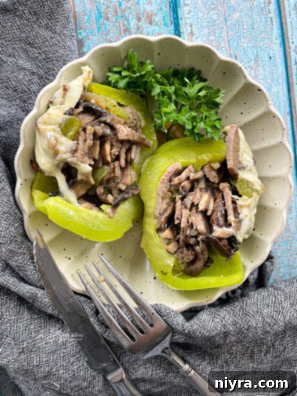 Loaded Philly Cheesesteak Peppers 17 Serving dish of Philly Cheesesteak Stuffed Peppers, ready to be enjoyed