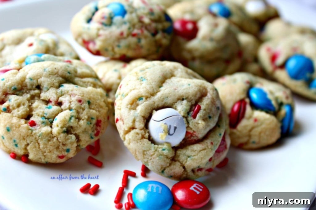 Stacked Patriotic M&M Pudding Cookies, showcasing their delightful texture and vibrant colors