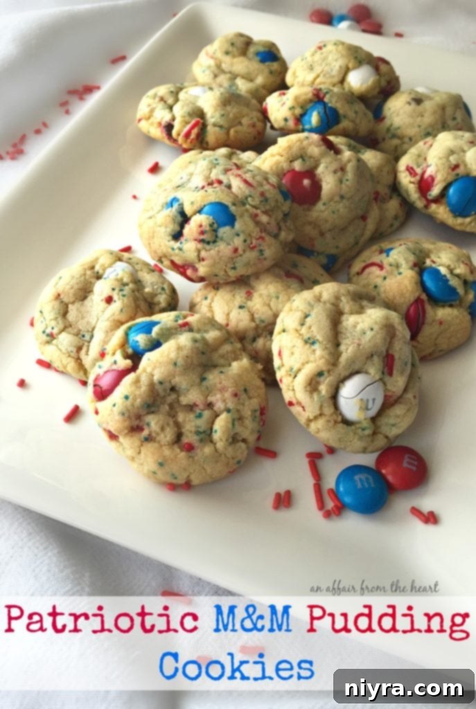 A selection of Patriotic M&M Pudding Cookies on a rustic wooden surface, ready to be enjoyed