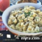 close up of Picnic Potato Salad in a white serving bowl