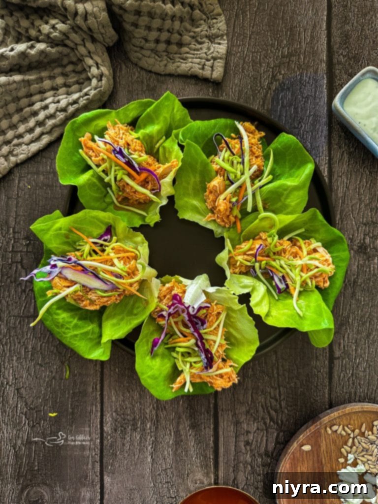 Crisp Buffalo Chicken Lettuce Wraps 11 Buffalo Chicken Lettuce Wrap topped with broccoli slaw and sunflower seeds